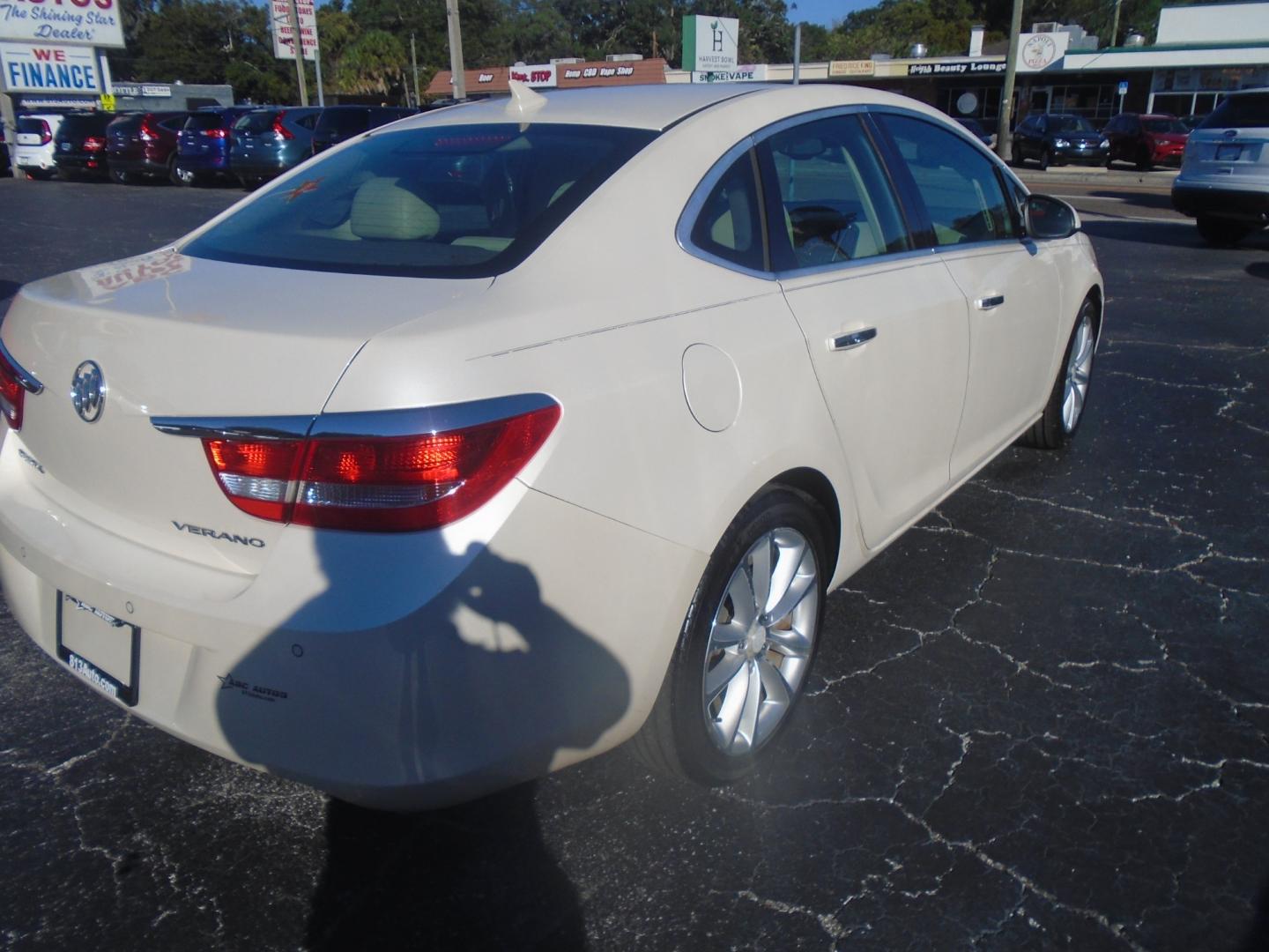 2012 White /Tan Buick Verano Convenience (1G4PR5SK6C4) with an 2.4L L4 DOHC 16V FFV engine, 6-Speed Automatic transmission, located at 6112 N Florida Avenue, Tampa, FL, 33604, (888) 521-5131, 27.954929, -82.459534 - Photo#3